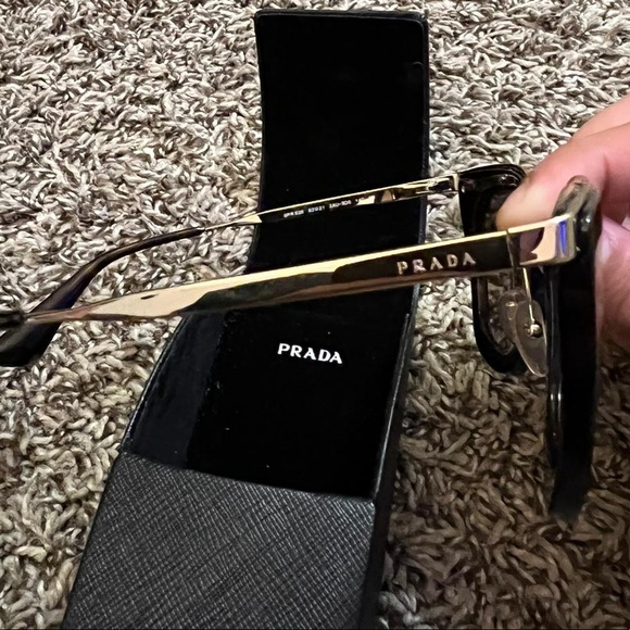Prada black and gold sunglasses